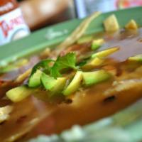 Chicken Tortilla Soup · Seasoned grilled chicken with fresh vegetables served with diced avocados and topped with gr...