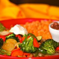 Veggie Fajitas · Sauteed mushrooms, carrots, zucchini, broccoli, onions, green and red bell peppers. Served w...