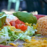Avocado Tostada Deluxe Combo · Served with rice and choice of refried or rancho beans.