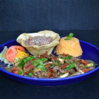PLATO DEL RANCHO · Top Sirloin steak slice and sautéed with mushrooms, crispy bacon, fresh cilantro and salsa v...
