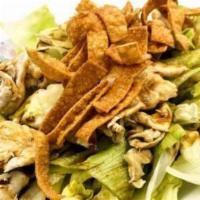 Chinese Chicken Salad · Our Chinese chicken salad is mixed with oven toasted chicken tossed with wonton crisps in a ...