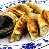 Potstickers · 8 pieces. juicy pork filling fried dumplings or steam version with our savory dipping sauce.
