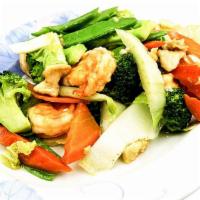 Seafood Happy Family · Delicious combination of shrimp, chicken, scallops, and vegetables tossed in our signature s...