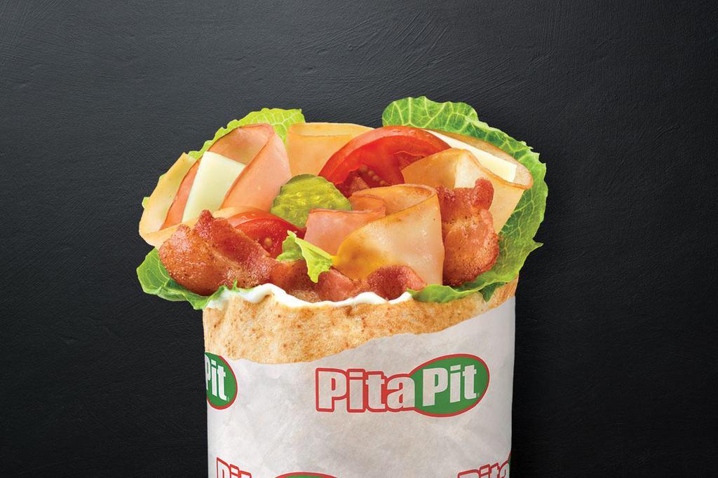 Kids Pita · Choose from ham, turkey, chicken, or falafel. Includes 3 toppings, 1 cheese, and 1 sauce.