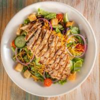 Garden Salad with Chicken · Tomatoes, red onions, cucumbers, topped with grilled, fried, or blackened chicken with choic...