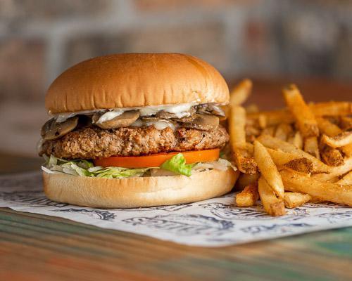 Turkey Mushroom Burger · Half pound certified Angus beef patty, cooked medium well topped with Monterey Jack cheese, mushrooms, lettuce, tomatoes and mayo, and served with choice of side.