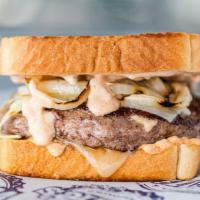 Texas Patty Melt · A half pound patty with two slices of Monterey Jack cheese, grilled onions, thousand island,...