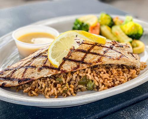 Grilled Redfish · Grilled or blackened redfish fillet served with choice of two sides.