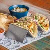 Baja Shrimp Taco · Grilled, fried or blackened gulf shrimp with cabbage slaw and chipotle mayo on corn tortilla...
