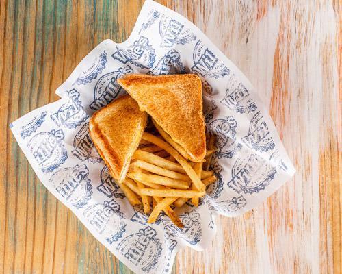 Kids' Grilled Cheese · Texas toast with American cheese served with choice of side