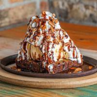 Willie Wonka · Triple chocolate brownie, topped with ice cream, whipped cream, chocolate sauce, and chopped...
