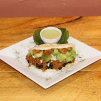 La Pabellon · Signature style corn cake stuffed with avocado, black beans, shredded beef, sweet plantain a...