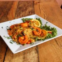 Arroz con Camarones · Shrimp rice served with sweet plantain and salad.