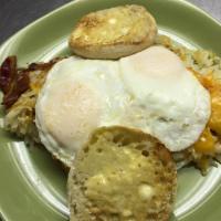 Corned Beef Hash  · Served with 2 eggs and toast. 