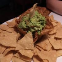 Fresh Homemade Guacamole · Avocado, tomato, onion, cilantro and lime juice. Served with our hand cut tortilla chips.