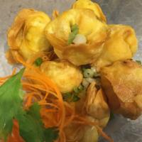 Crab Rangoon · 7 pieces. Imitation crab sticks, scallions, carrot, onions and cream cheese served with swee...