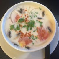 Tom Kha Coconut Chicken · Homemade coconut broth with chicken, mushrooms, tomatoes and onions.—- Contain with shellfish 