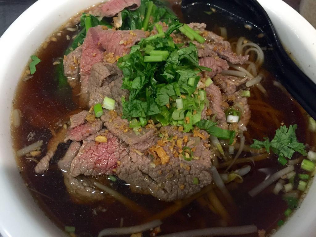 Beef Noodle Soup Bowl · Sliced beef with thin rice noodles in beef broth, scallions, Chinese broccoli, Asian celery and bean sprouts.
