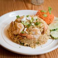 Tom Yum Fried Rice · Stir-fried jasmine rice with Thai spices Tom yum shrimp paste, egg, mushrooms, carrots and b...