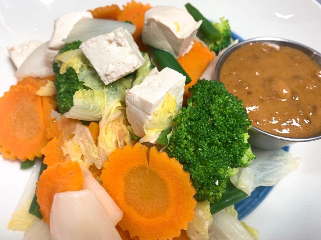 Steamed Vegetables and Tofu · Steamed mixed vegetables and steamed tofu with our homemade peanut sauce. Vegan and gluten free.