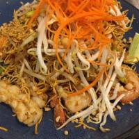 Crispy Pad Thai · Crispy egg noodles with seafood( shrimp& Squid), egg, fish sauce ground peanut, scallions an...