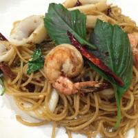 Spaghetti Seafood · Sauteed shrimp and squid with basil leaves, dry chili and onions. Spicy.