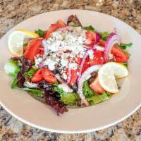 Pomodoro Salad · Fresh Roma tomatoes, Bermuda onions, capers, black olives, just squeezed lemon and Gorgonzol...