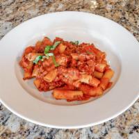 Pasta Bolognese · Ground veal, pork and beef in tomato ragu. 