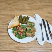 Dolma Cabbage Plate · Ground beef meat mixed with rice, parsley, onions, special spices, tomatoes, bell peppers an...