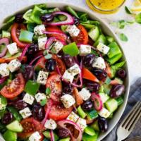 Greek Salad · Lettuce, tomatoes, cucumber, onion, black olives, peppers and feta cheese.