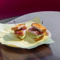 Turkey Club Sandwich · Served on sourdough.
