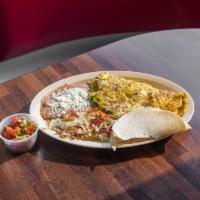 Carne Asada Omelette · Eggs, carne asada, onion and bell pepper. Served with hash brown or beans and choice of flou...
