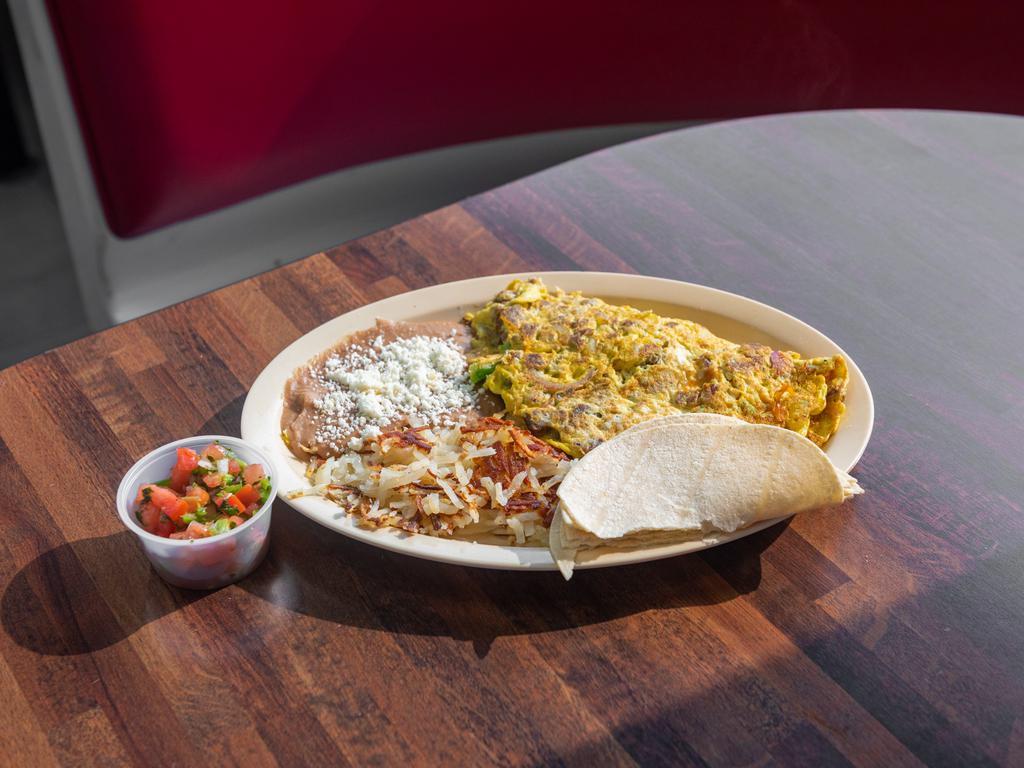 Carne Asada Omelette · Eggs, carne asada, onion and bell pepper. Served with hash brown or beans and choice of flour or corn tortillas.