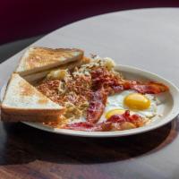 Hash Brown Special · Hash browns,2 eggs, bacon, or sausage and choice of toast.