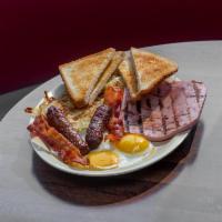 #2. Three Eggs & Choice of Meat · 3 eggs and choice of ham, bacon, sausage, or hamburger patty. Served with hash browns, toast...