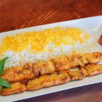 Joojeh Kebab · Gluten-free. One skewer of saffron chicken served with fluffy rice topped with saffron and a...