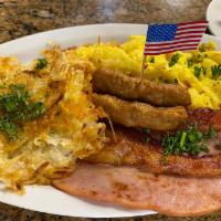 The Meat Lover · 2 eggs with ham, 2 sausage links and 2 bacon with choice of grits, home fries or hash browns...