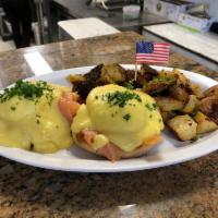 Smoked Salmon Benedict · 2 Poached eggs with smoked salmon on English Muffin topped with our house Hollandaise sauce 