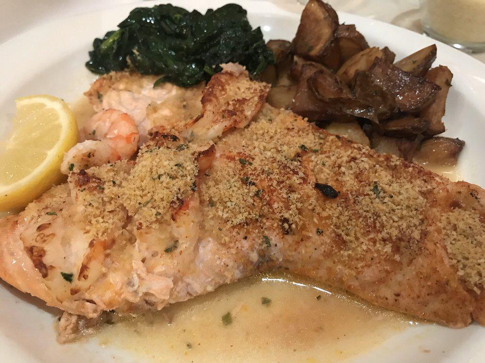 Salmone e Shrimp Areganato · Broiled salmon and shrimps combination with white wine lemon garlic sauce and bread crumbs on top. Served with potatoes and vegetables.