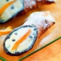 Cannoli · Pastry shell internally coated inchocolate and filled with ricotta,
 and chocolate chips