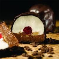 Bomba · Classic vanilla and chocolate gelato separated by a cherry and sliced almonds covered in cin...