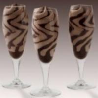 Hazelnut Flute · Smooth hazelnut gelato swirled with rich chocolate sauce presented in a flute glass