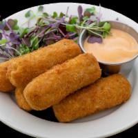 Deep-fried  Ham Fritters w/Dip · Breaded fried ham fritters with dipping sauce.