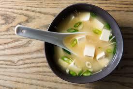 Miso Soup · Traditional Japanese soup consisting of dashi stock, miso paste and scallions 