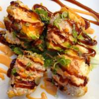Avocado Bomb · Tempura Avocado stuffed with spicy tuna, over a bed of lettuce with spicy mayo and sushi sau...