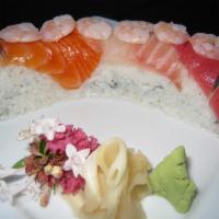 Sunrise Special Roll · Cali roll topped with tuna, salmon, white fish and shrimp on top.