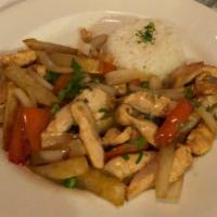 Pollo Saltado · Chicken sauteed with fried potatoes, onion, tomato served with rice.