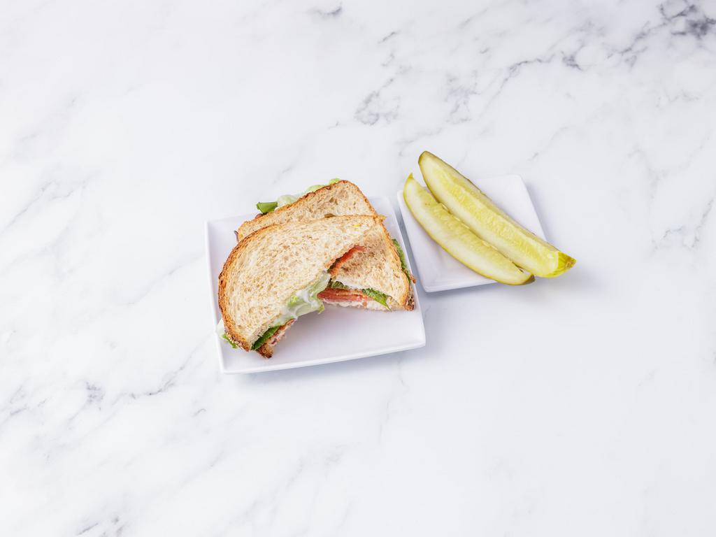 BLT Sandwich · Applewood smoked bacon, lettuce, and sliced tomato served on toasted honey wheat bread with mayonnaise.