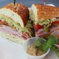 2. Black Forest Ham Sandwich · Cajun mayo, Yellow mustard, lettuce, tomato, red onion, and pickles.