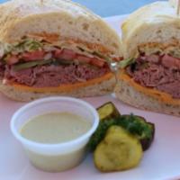 3. London Broil Roast Beef Sandwich · Cajun mayo, Yellow mustard, lettuce, tomato, red onion, and pickles.